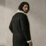 Man wearing Nocturn Men's Black shearling coat by snag leather