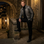 man wearing the shadowcast men's dark charcoal leather aviator jacket by snagleather