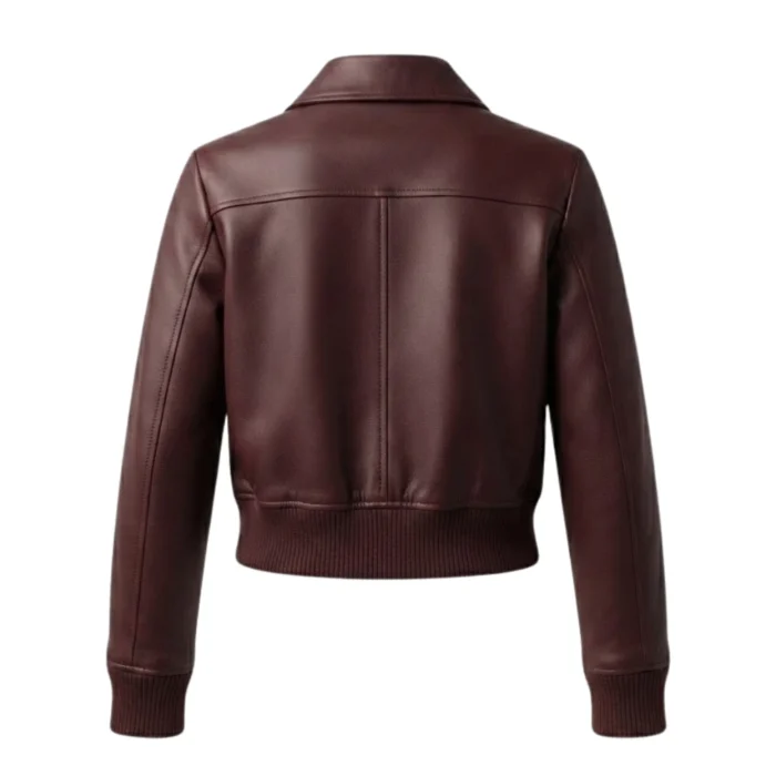 backside shot of Women's cropped maroon leather bomber jacket with point collar, dark gunmetal zip and ribbed cuffs — Claret by Snag Leather